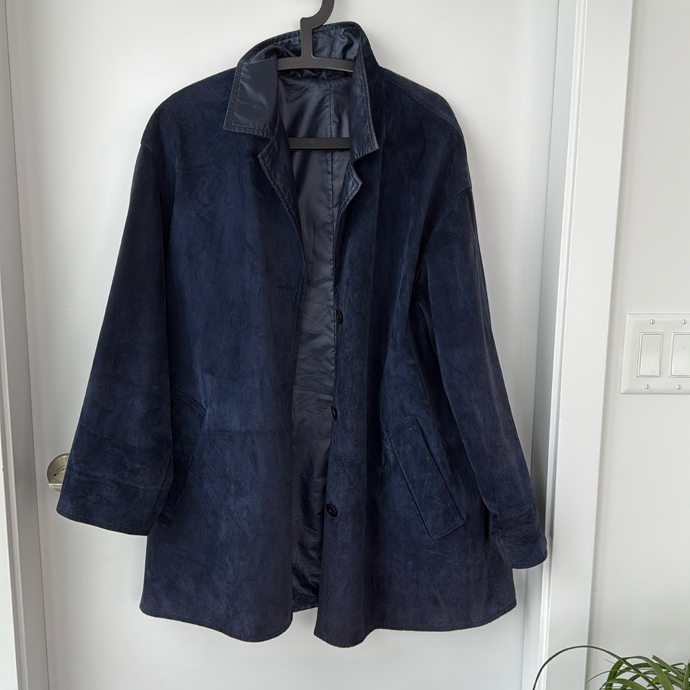 Oversized blue suede reversible rain jacket.